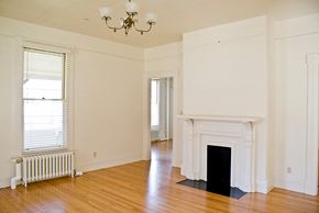 San Francisco apartment for rent - a living room with a fireplace and a wooden floor