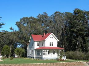 San Francisco apartment for rent - a white house with a red roof on a lawn