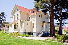 San Francisco apartment for rent - a white house with a red roof and a tree