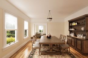 San Francisco triplex for rent - a dining room with a wooden table and chairs
