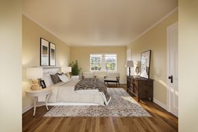 San Francisco triplex for rent - a bedroom with a bed and a dresser and a window