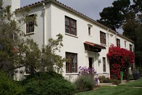 San Francisco triplex for rent - a white house with a garden in front of it