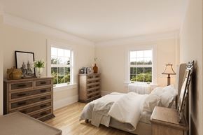 San Francisco triplex for rent - a bedroom with a bed and dressers and two windows