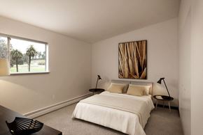 San Francisco townhouse for rent - a bedroom with a bed and a large window