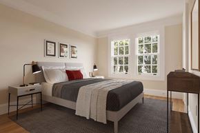 San Francisco triplex for rent - a bedroom with a bed and two windows