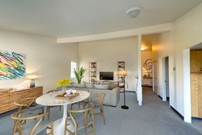 San Francisco townhouse for rent - a living room with a round table and chairs and a couch