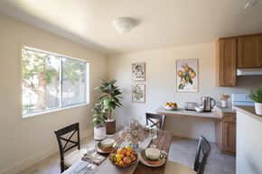San Francisco townhouse for rent - the dining room and kitchen of a house with a table and chairs