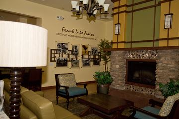 Phoenix apartment for rent - a living room with a fireplace and a table and chairs