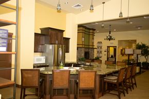 Phoenix apartment for rent - a large kitchen with a center island and a dining table