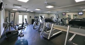 Royersford apartment for rent - a gym with various cardio machines and weights