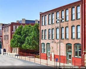 Wichita apartment for rent - a row of brick buildings on the side of a street