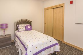 Dakota Dunes apartment for rent - a bedroom with a bed and a closet