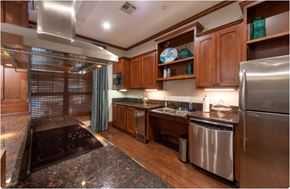 Houston apartment for rent - a kitchen with granite counter tops and stainless steel appliances