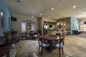 San Antonio apartment for rent - A dining room with a table set for six.