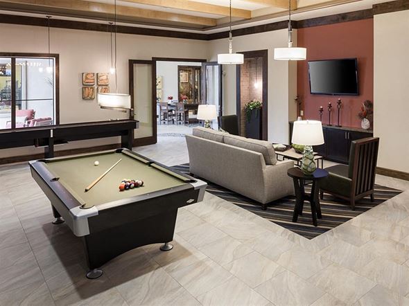 Tomball apartment for rent - a living room with a pool table
