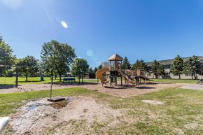 Melrose apartment for rent - A playground with a slide and a swing set.