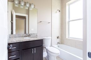 Chicago apartment for rent - a bathroom with a sink toilet and a bath tub