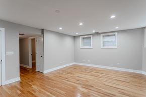 Chicago apartment for rent - a living room with a hard wood floor and grey walls