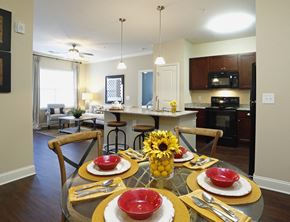 Sanford apartment for rent - A dining room with a table set for a meal.