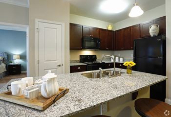 Granite countertops in all kitchen and baths