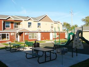 St Cloud townhouse for rent - a playground in a park with houses in the background