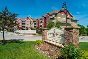 Plymouth apartment for rent - an apartment building with a sign that reads east view estates