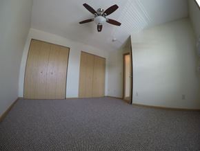 St Cloud townhouse for rent - an empty living room with a ceiling fan and