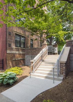 Springfield apartment for rent - a set of stairs in front of a brick building