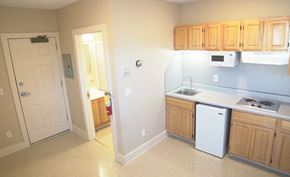 Northampton apartment for rent - a kitchen with a sink and a door to a bathroom