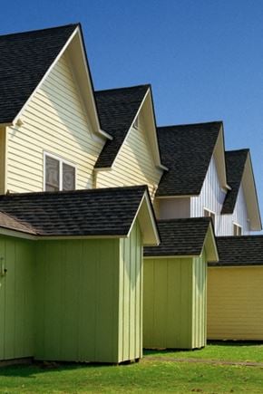 Northampton apartment for rent - a row of houses with green garages