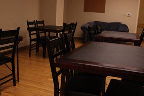 Ludlow apartment for rent - a dining room with tables and chairs and a couch
