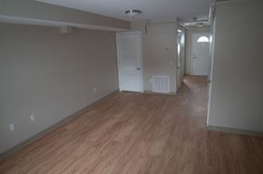 Holyoke townhouse for rent - an empty living room with a wood floor