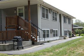 Charlton apartment for rent - the front of the house with a grill on the sidewalk