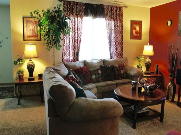 Shakopee apartment for rent - a living room with a couch and a table