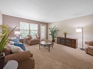 Howell apartment for rent - a living room with a couch and a table
