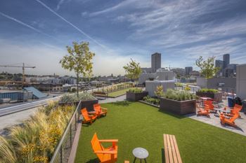 Large roof sun-deck with bbq areas