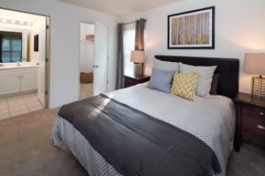 Shrewsbury apartment for rent - a bedroom with a large bed and a bathroom