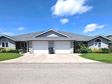 Brandon apartment for rent - a house with a driveway and a garage door
