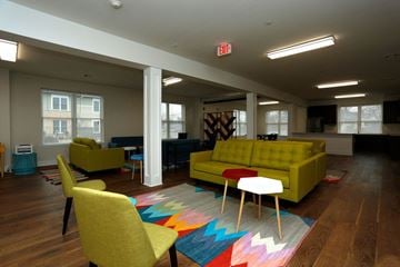 Hillsborough apartment for rent - a living room with couches and chairs and a rug