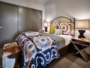 Hillsboro apartment for rent - a bedroom with a bed and a nightstand with lamps