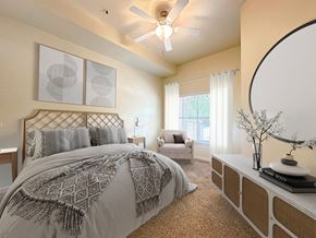 Provo apartment for rent - Liberty Center Apartments, Provo, Utah, Bedroom with queen bed, mirror, shelf, chair and artwork.