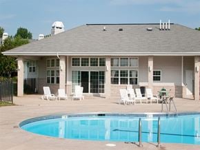 Oak Creek apartment for rent - a swimming pool in front of a house with a pool