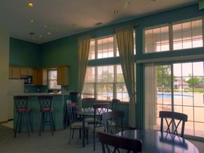 Oak Creek apartment for rent - a dining room with a table and chairs and large windows