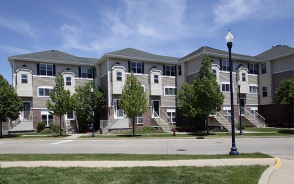 Cudahy condo for rent - an apartment building on the corner of a street