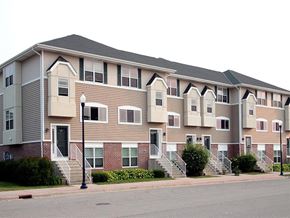 Cudahy condo for rent - an apartment building on the corner of a street