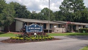 Savannah apartment for rent - a building with a sign in front of it