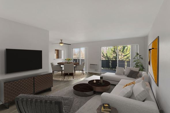 Denver apartment for rent - a living room with a couch and a table and a tv