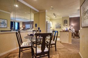 Antonio apartment for rent - a dining room with a table and chairs