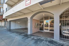 San Francisco apartment for rent - A white car is parked in a garage.
