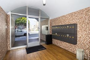 San Francisco apartment for rent - A room with a brick wall and a black speaker.